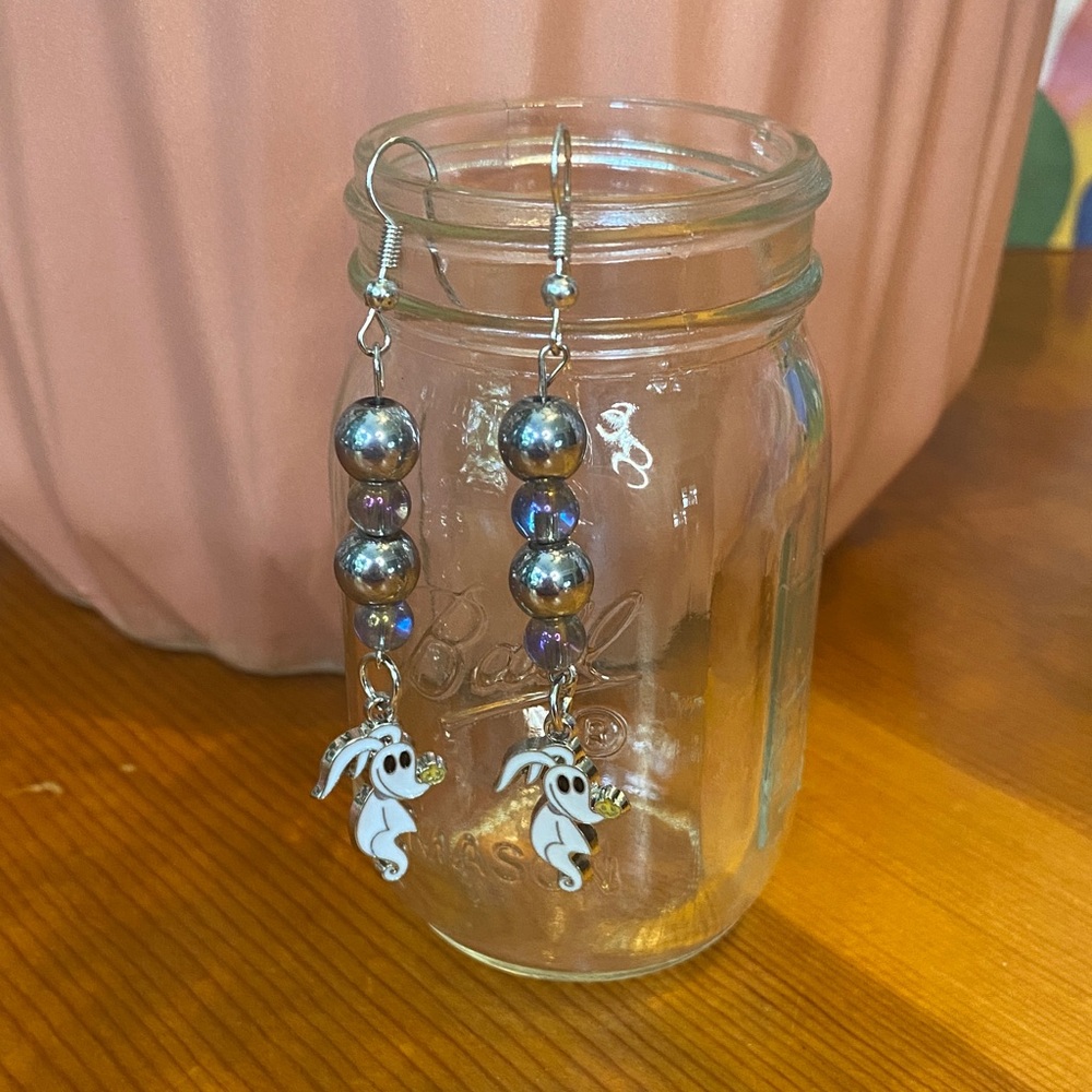 Charming Silver and Glass Bead Fashion Earrings with a Zero Charm